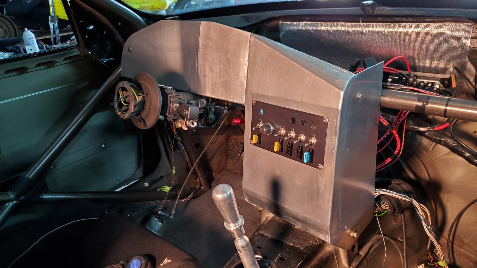 Dashboard controls and shifter installed in the E36 BMW race car