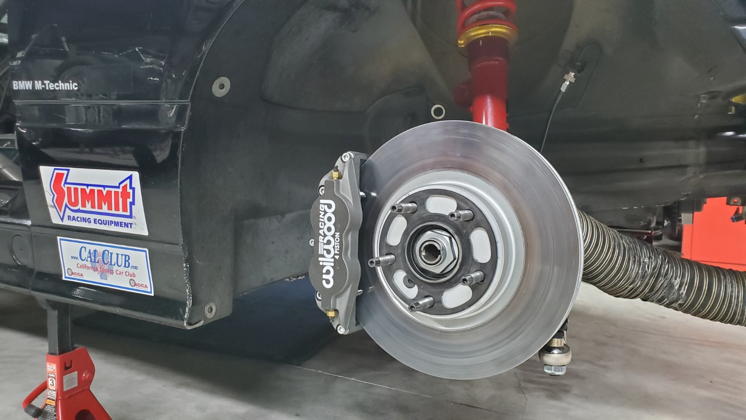 Wilwood brake caliper and front brake assembly on the E36 BMW
