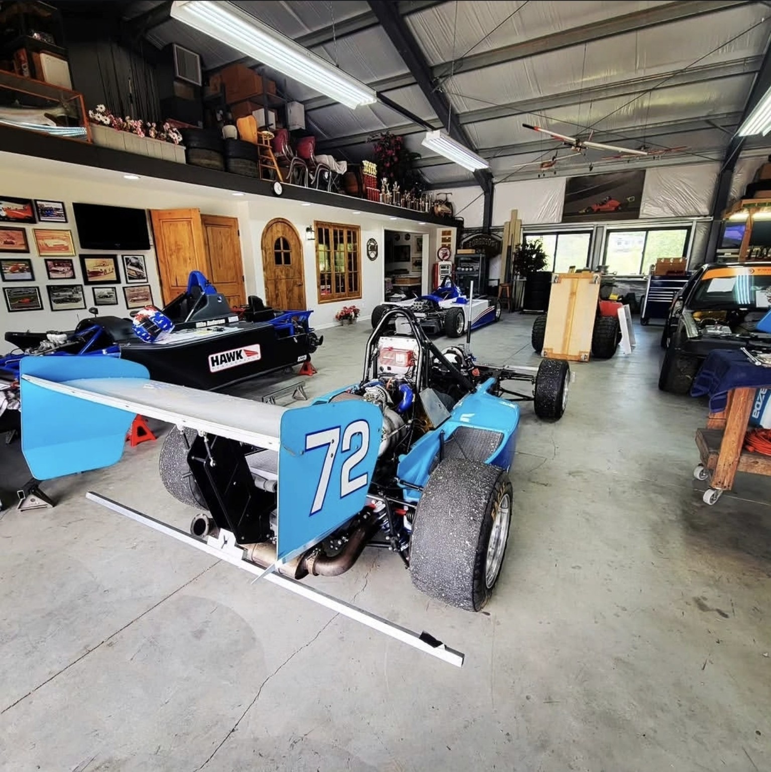 Formula race cars in the Mike Anderson Racing workshop