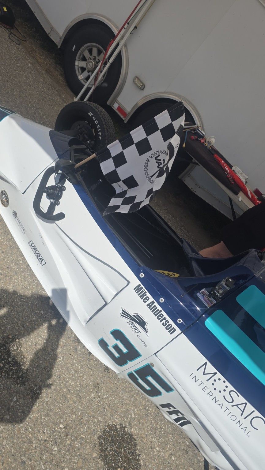Checkered flag displayed in Mike Anderson's restored Swift DB1 after winning at Buttonwillow