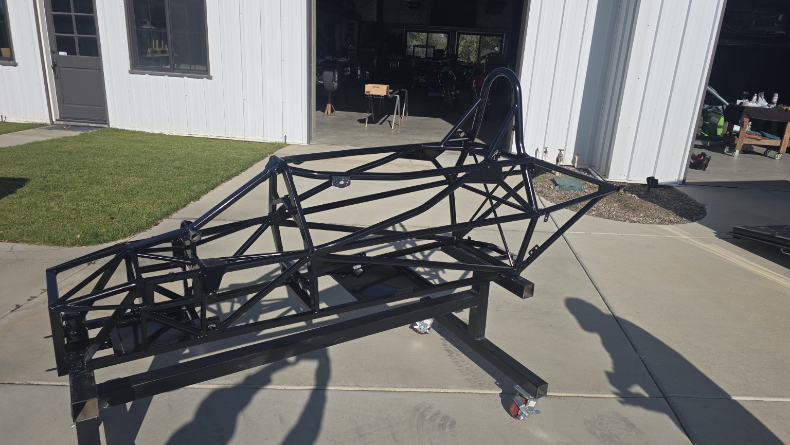 Bare Swift DB1 tubular chassis during restoration